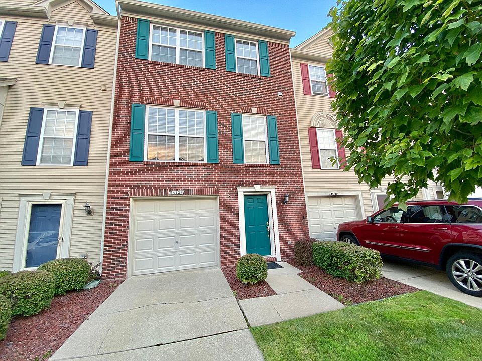 Beautiful brick, three story condo