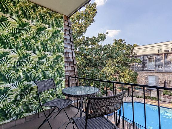 Private, north-facing covered patio overlooking a rarely-used pool