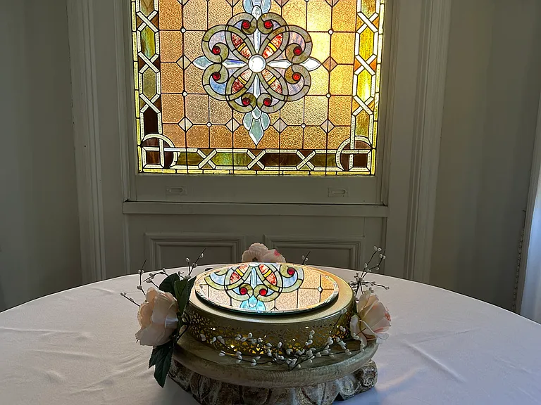 Example of several stain glass windows original to house