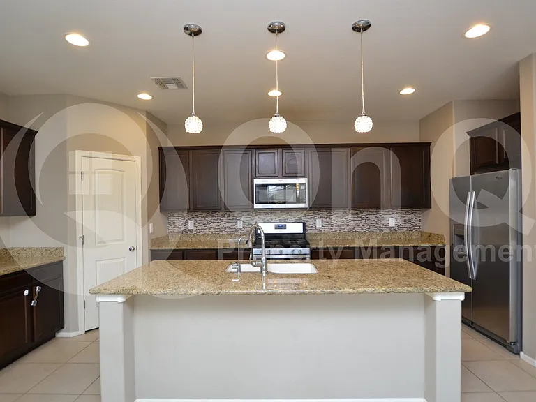 12039 W Briles Rd — Photo 4