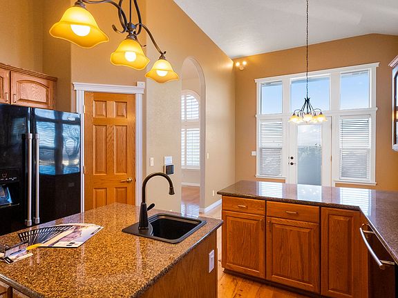 4th image of 6491 N Hillsboro Pl
