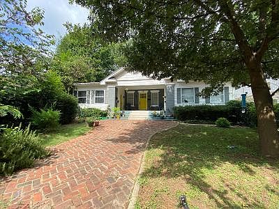 Fenced in shared front yard.