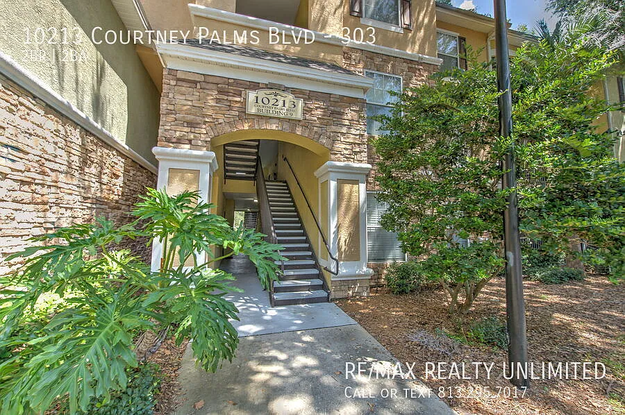 10213 Courtney Palms Blvd #303 Tampa, FL 33619 — Photo 1