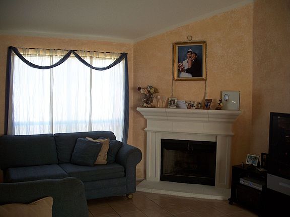 Living area with wood burning fireplace