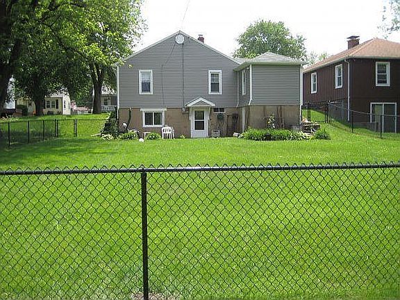 new vinyl coated fence, patio out back