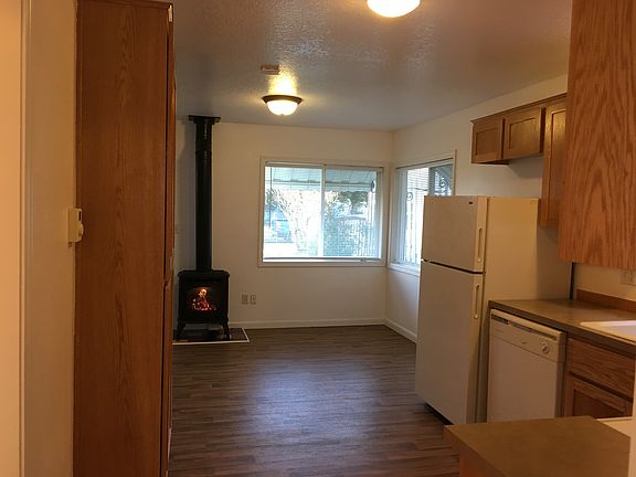 Kitchen and Front Room, Large Pantry, Plenty of Storage, Refrigerator, Dishwasher, Range, and Microwave