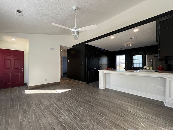 Living Room with Cathedral Ceilings