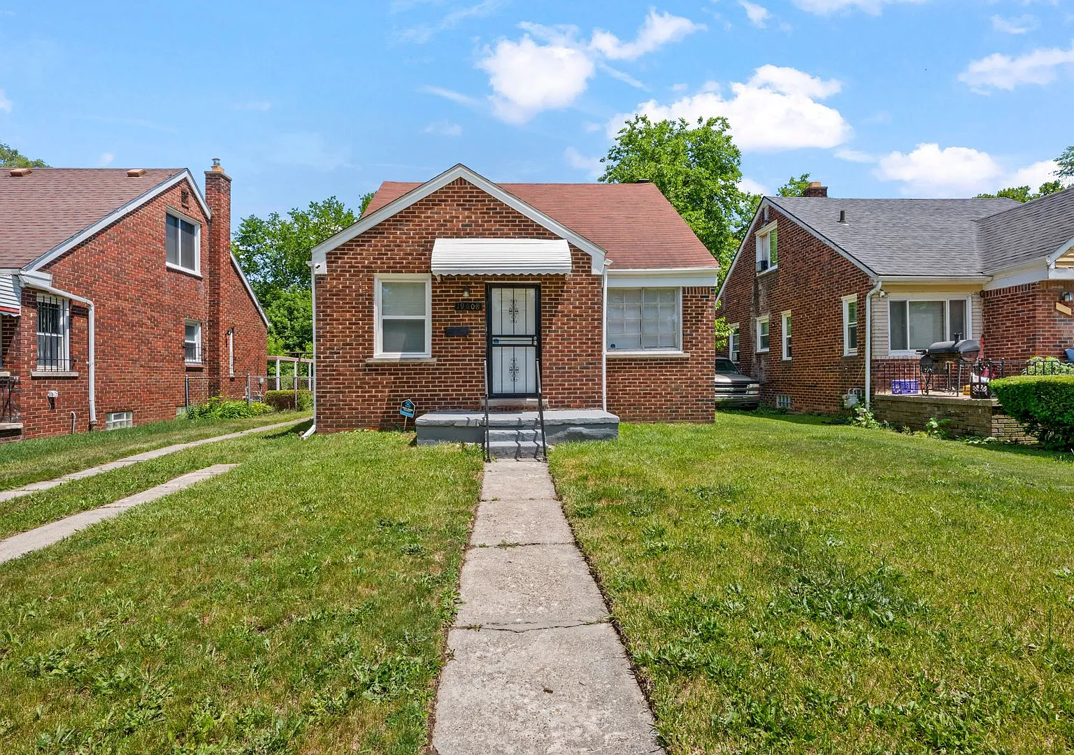 19608 Buffalo St is a 3-bedroom brick bungalow for rent in Detroit's Pershing neighborhood for $1... — Photo 1
