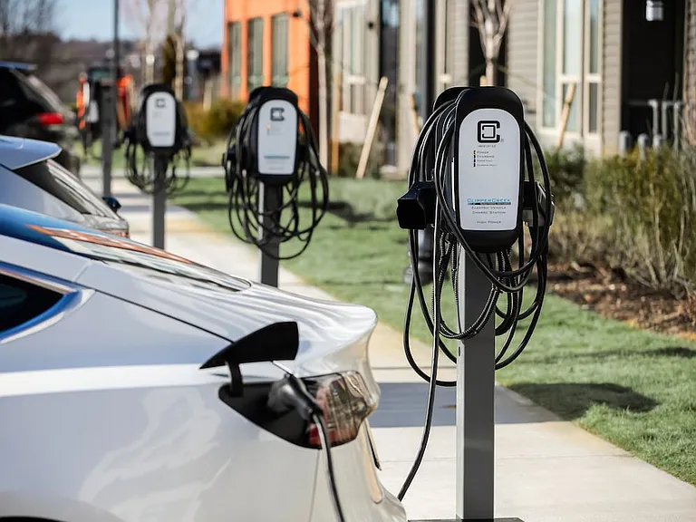 Surface parking with EV charging stations available and garages with EV charging capability (Representative photo)