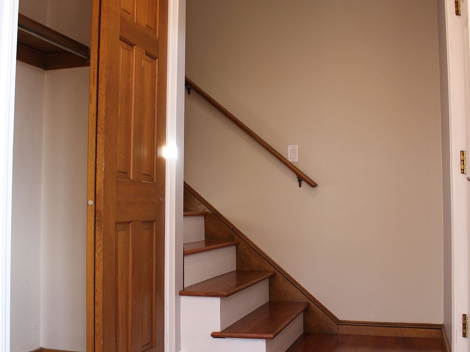 Coat closet/ stairs to 2nd floor