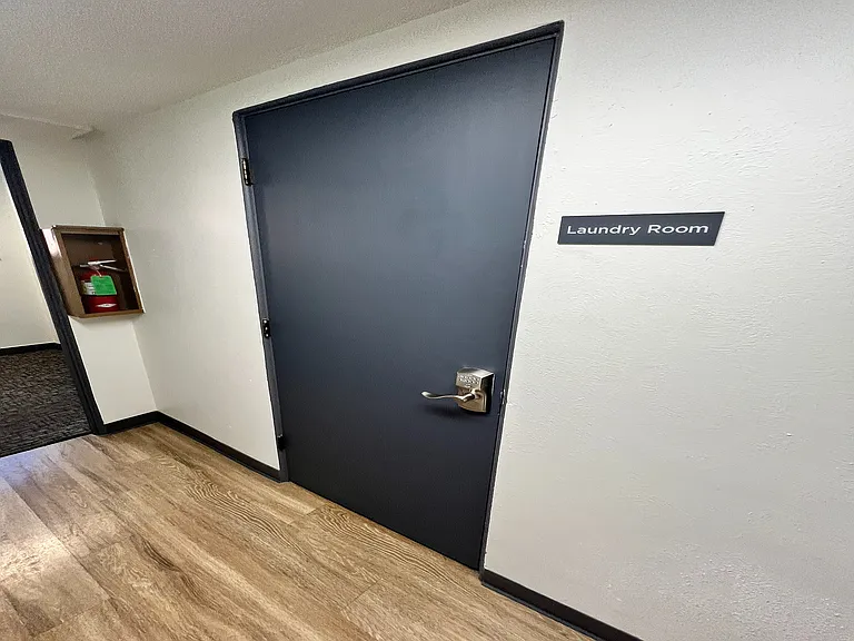 Step into convenience with this chic laundry room entrance.