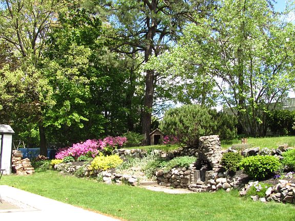 Peaceful yard with gardens
