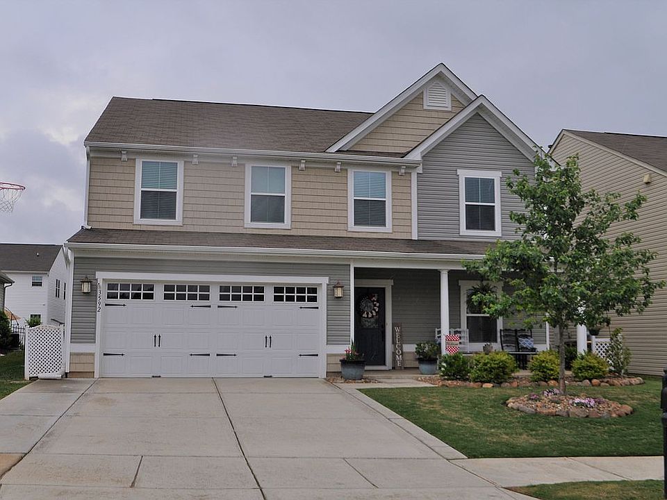 Front w/extended driveway
