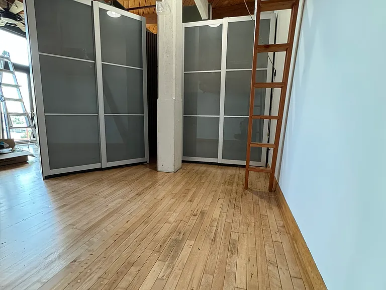Oversized storage closets with sliding doors (to hide everything), hangers, shelves and drawers