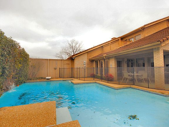 Pool with waterfall