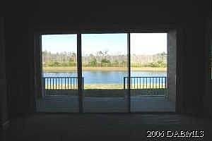 family room looking back towards lake w/no houses on it ever