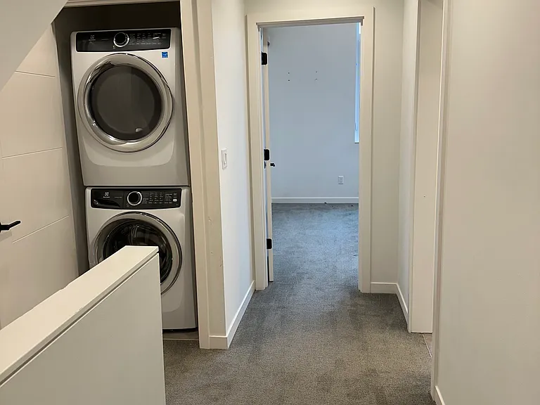 Full size washer and dryer on top floor.