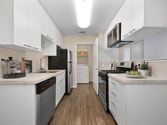 Kitchen & Laundry In The 2 Bedroom Floor Plan