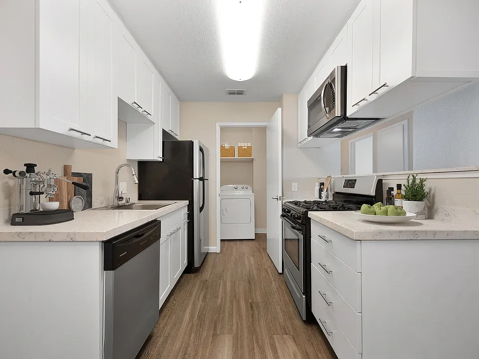 Kitchen & Laundry In The 2 Bedroom Floor Plan