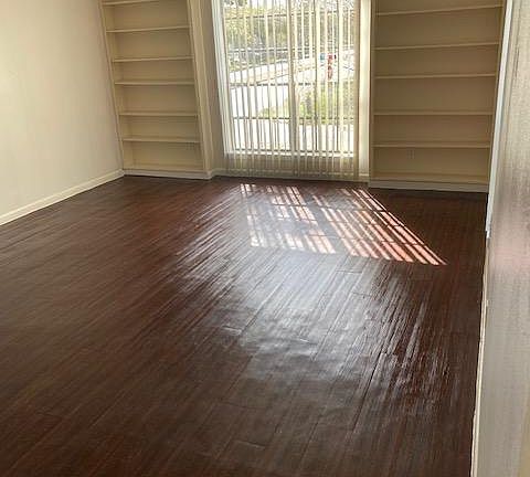 Large living with built-in bookcases