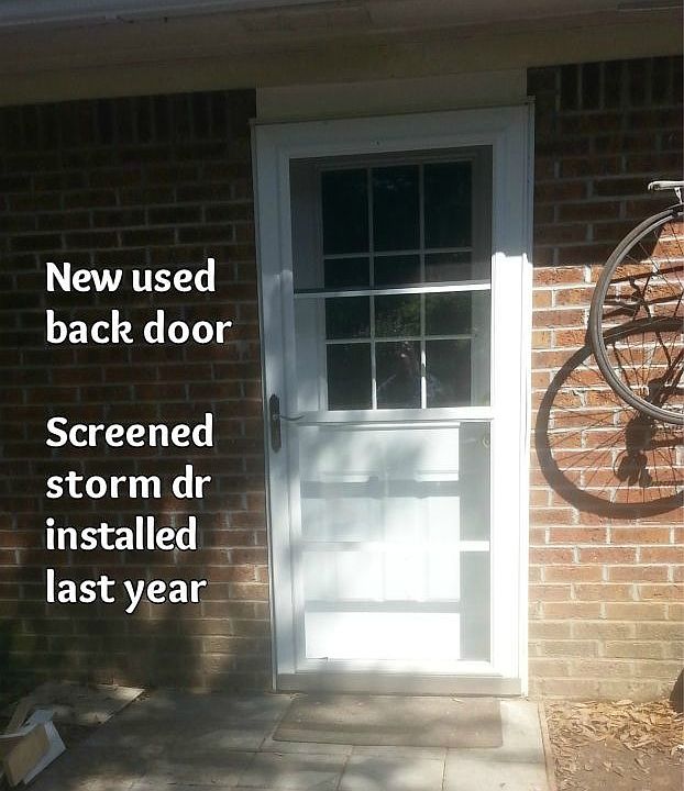 private entrance with storm door