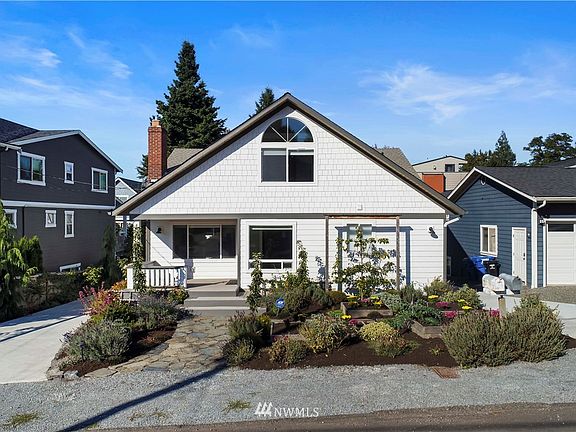 Charming and renovated Marine View area home featuring beautiful landscape, drive through access to back of property, 3 car detached garage & shop, and large grass play area~3370  renovated square feet offers lots of possibilities for multigenerational living