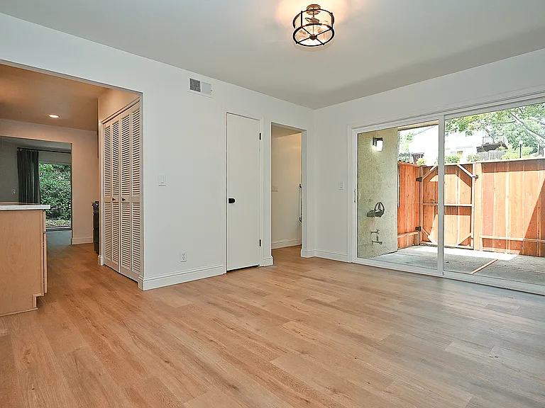 Den/living room to side patio