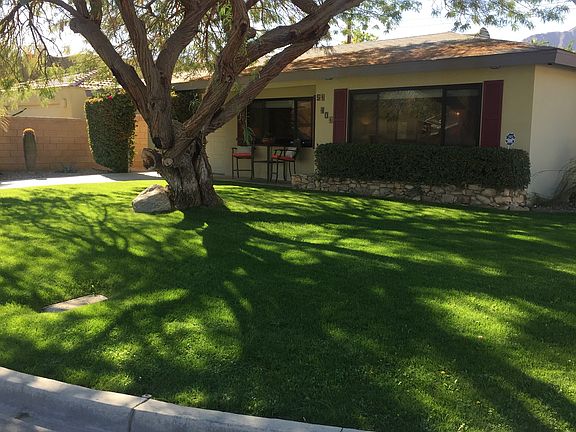 Front yard has been enhanced with new hedge and gate, adding more outdoor living space and privacy.