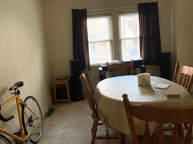 Home Office. Could double as a dining room. Carpeting has been removed - NOW beaming hardwood floors.