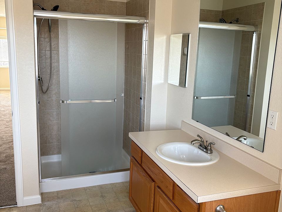 Bathroom. On the wall opposite the sink is a large linen closet.
