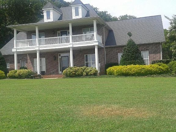 Front view coming up the paved driveway