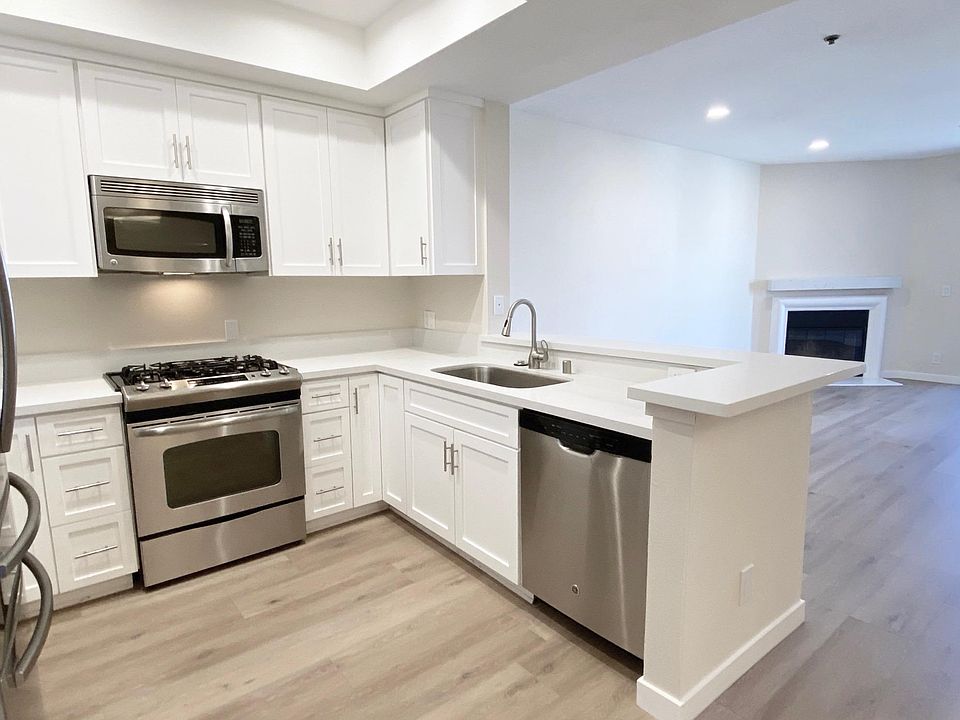 Kitchen and living room of apartment #201