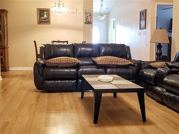 FAMILY ROOM WITH WOODBURNING FIREPLACE