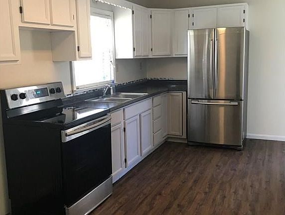 4th image of 8120 Woodlawn Dr