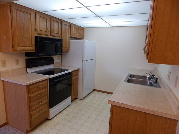 The galley style kitchen has great space and is open to the dining room.