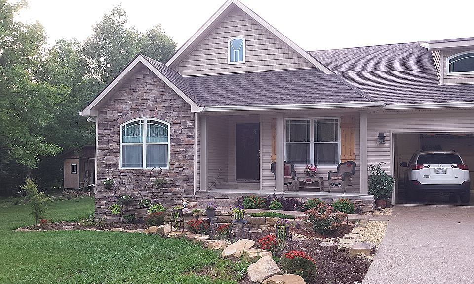 Stone lined front porch