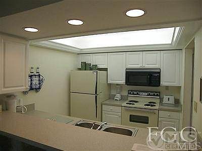 New updated kitchen with tray ceiling, new cabinets