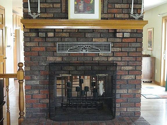 Double-sided wood burning fireplace