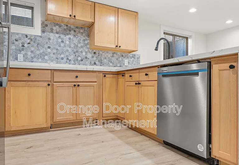 7727 Jones Ave NW — Photo 10