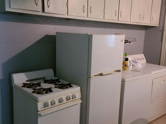 Kitchen appliances are small apartment size and will not be removed...