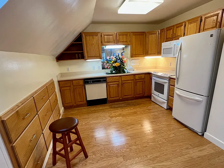 Kitchen, 15.6 x 11' 
six large drawers under eaves.