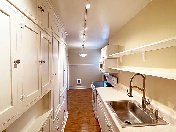 Galley Kitchen with Dishwasher, Disposal, Glass-Top Range