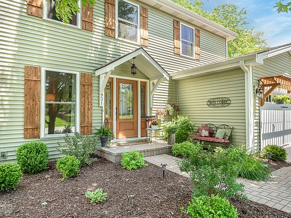 The Shutters & portico create a charming cottage vibe!