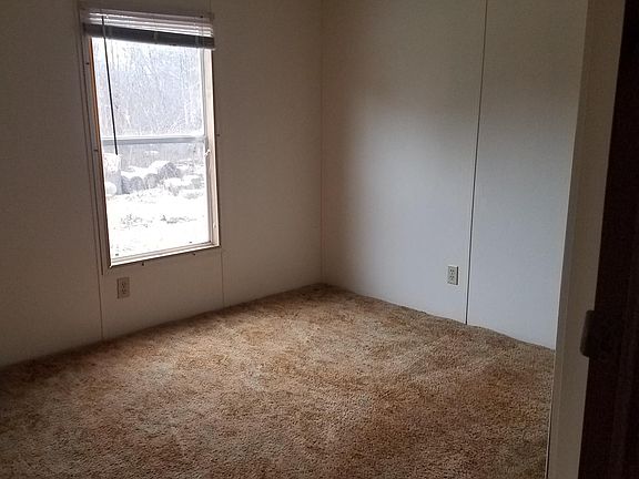 Second bedroom with ceiling fan