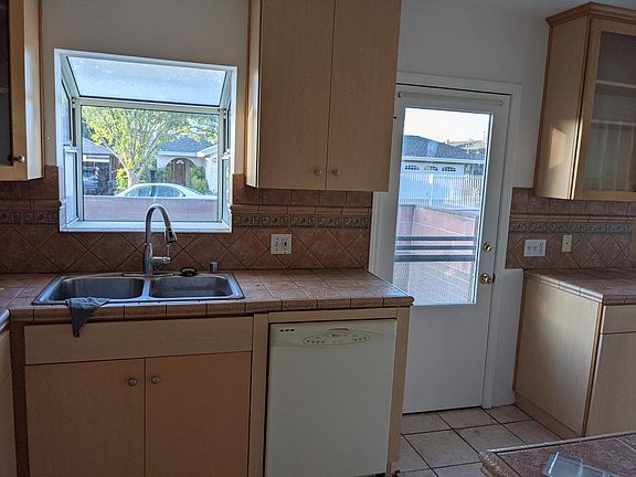 Dishwasher, storage, sink.