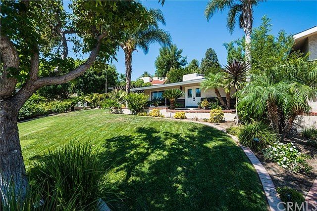Welcome home!  Lush lawn welcomes you to this 4 br 4 bath home at the end of a cul-de-sac.