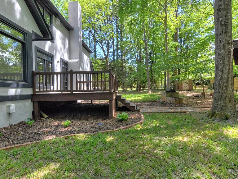deck off the back of the house. Can be access from the kitchen and by the great room. 2023