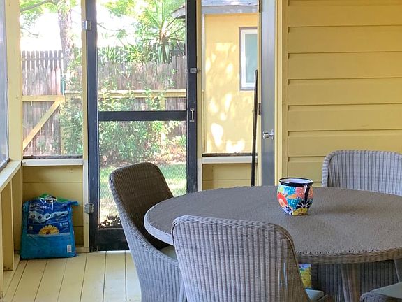 Private screened porch. Shared backyard space.