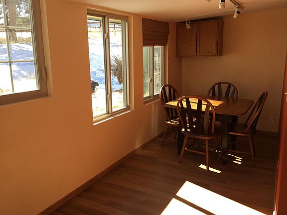 The kitchen alcove is very sunny and makes a great dining area.
