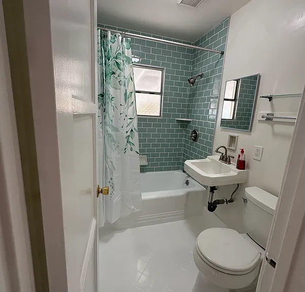 Newly tiled shower & reglazed tub